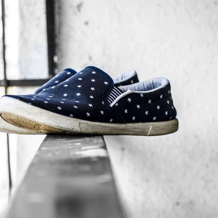 Zapatilla de lona azul